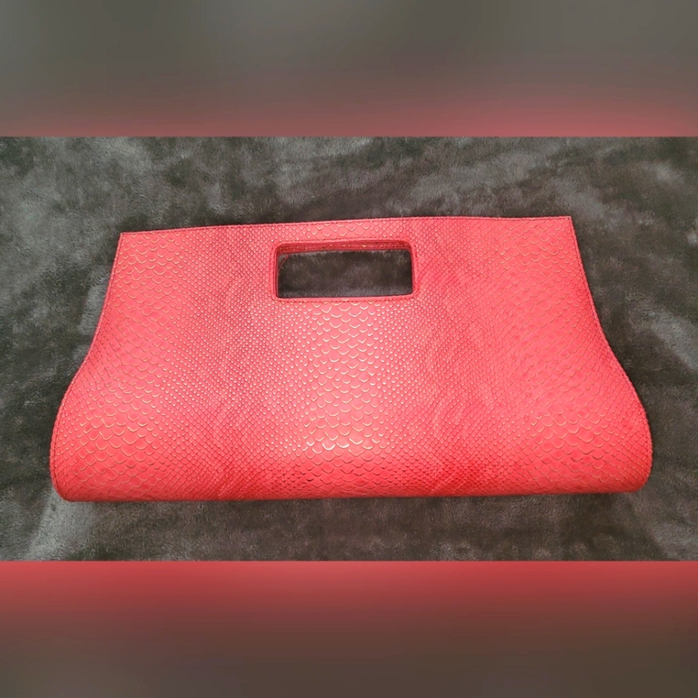 Tangerine embossed faux leather clutch